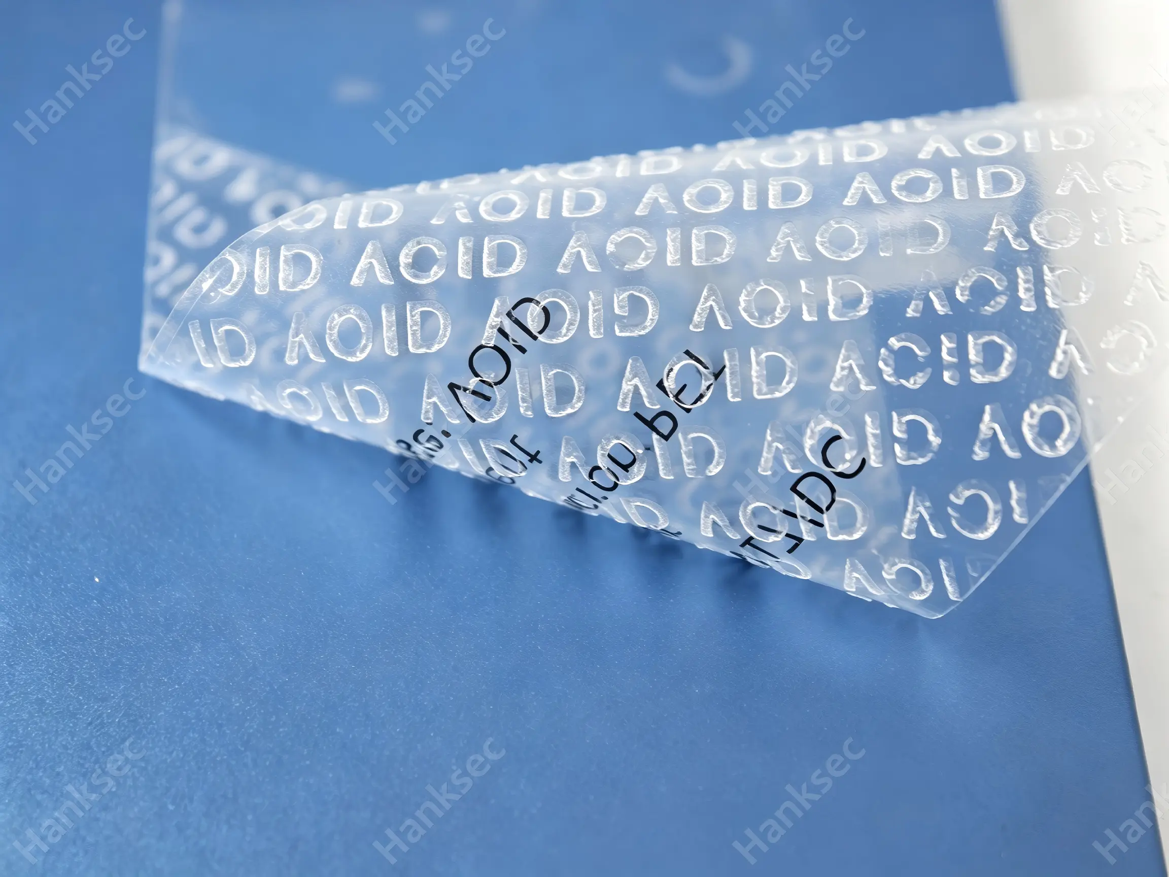 VOID label adhesion test on plastic surface